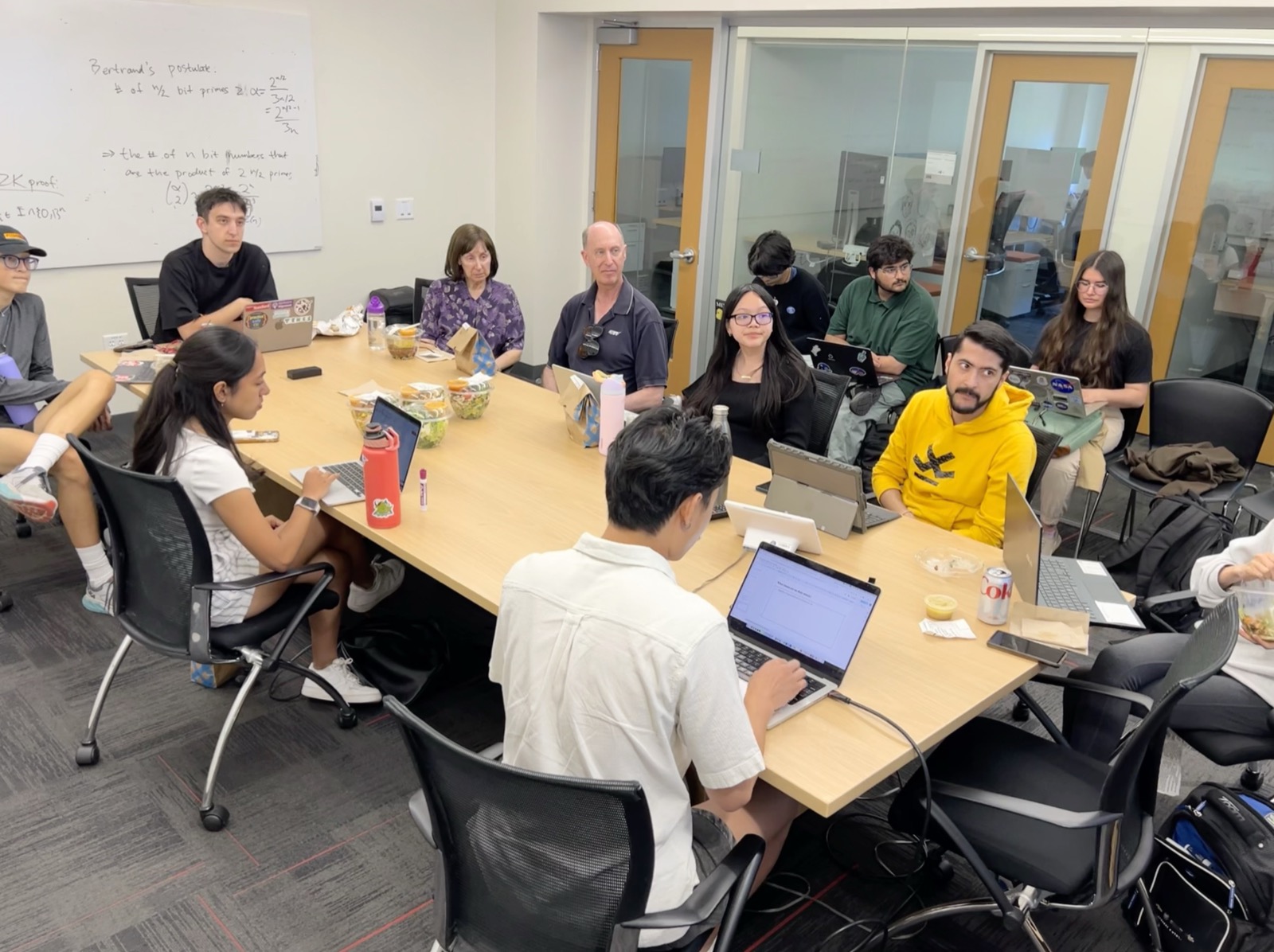 Members around a table at a SAIA meeting